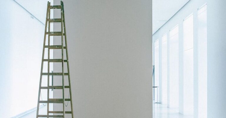 AC Installation - Empty corridor with ladder and lamps on ceiling
