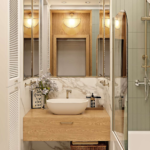 bathroom sink on wooden countertop